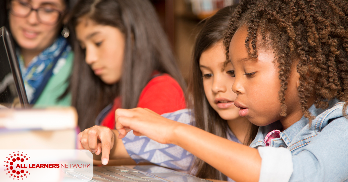 Two young students working together